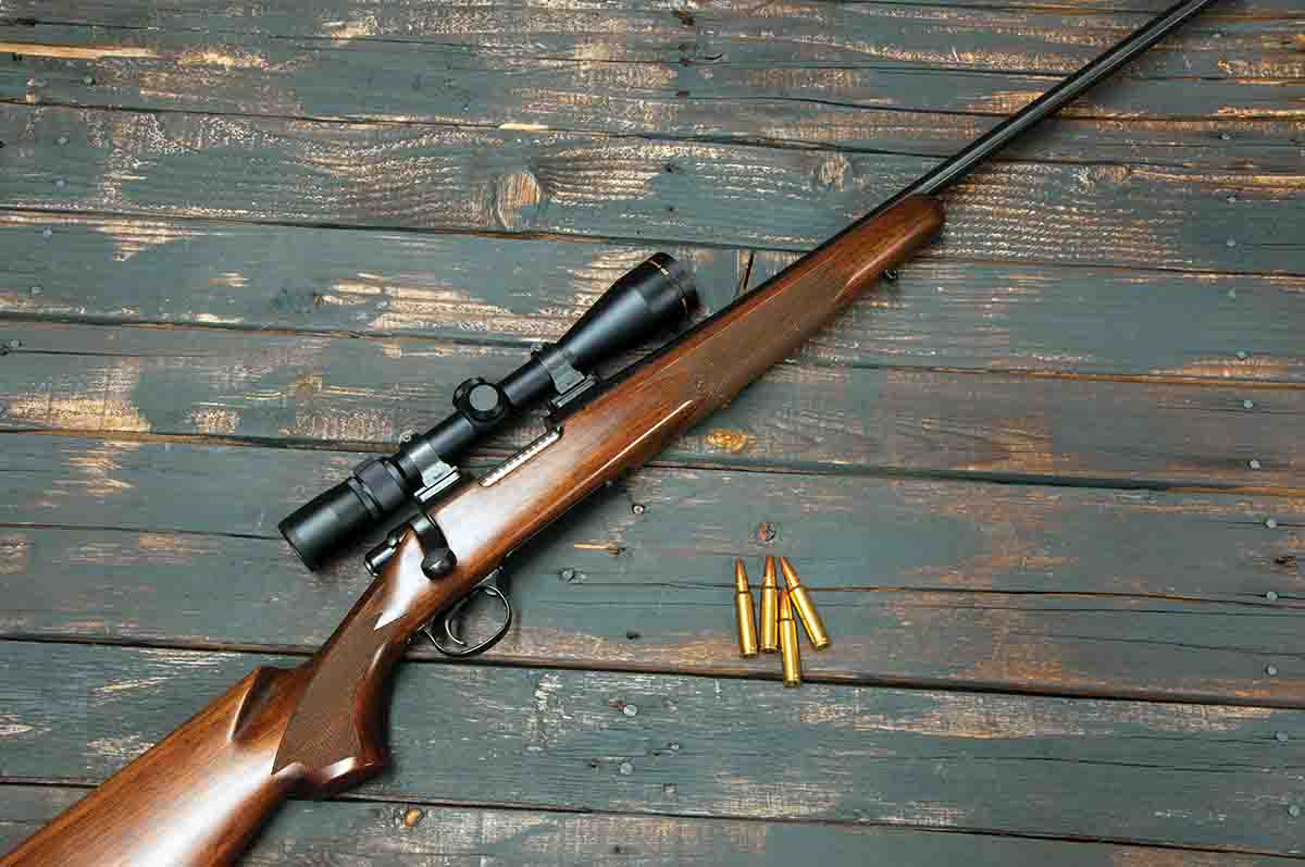 Model 700 Classic rifles like this .300 Savage featured nice walnut and a straight comb. Reasonably nice machine-cut checkering was also standard.